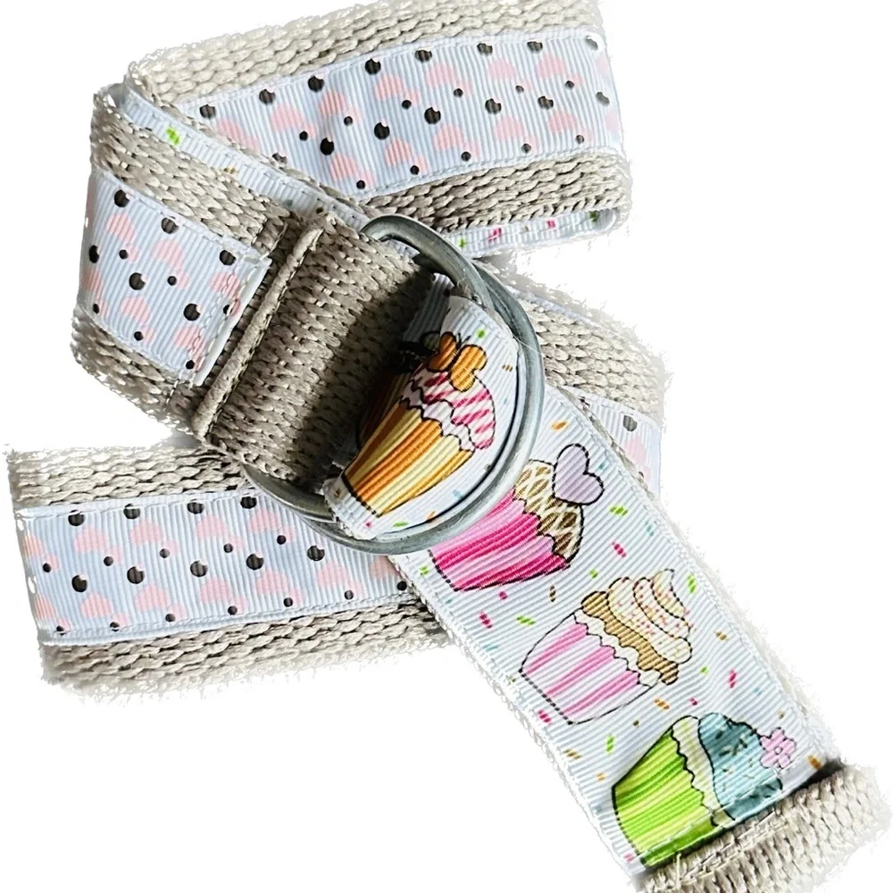 Belt, cupcakes and reverses to hearts on backside Celebrate in style.Adjustable